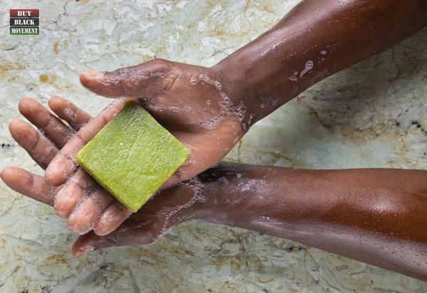Brother washing his hands with Afro Botanicals Matcha Tea Soap